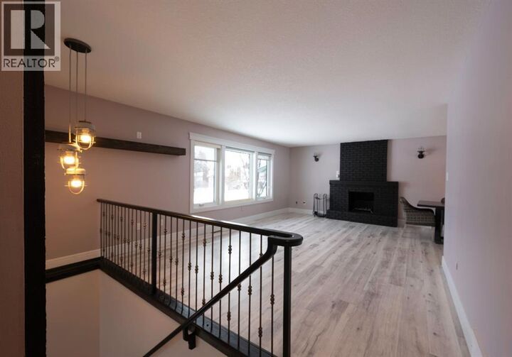 Property Photo:  113 Dundas Road  AB T9K 1B8 