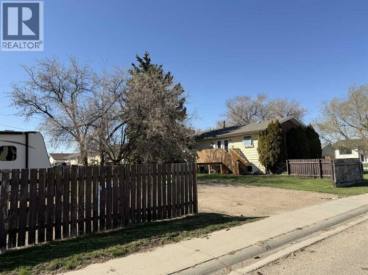 Property Photo:  3917 52 Street  AB T1G 1B7 