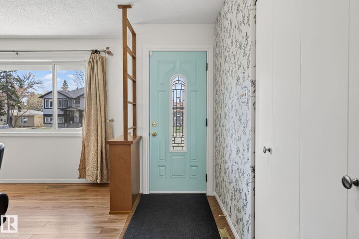 Property Photo:  10719 152 Street NW  AB T5P 1Z2 