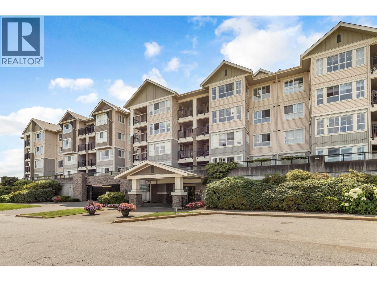 Property Photo:  19673 Meadow Gardens Way 317  BC V3Y 0A1 