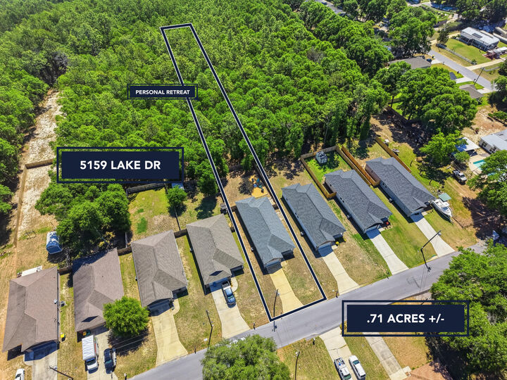 Property Photo:  5159 Lake Drive  FL 32539 