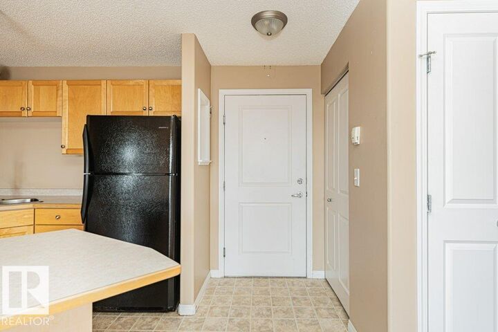 Property Photo:  245 Edwards Drive SW 316  AB T6X 1J9 