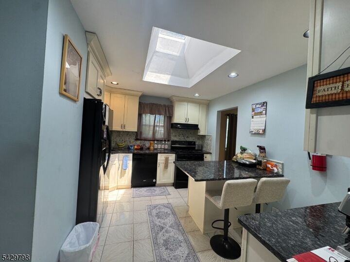 Property Photo:  8 Berkeley Ter  NJ 07039 