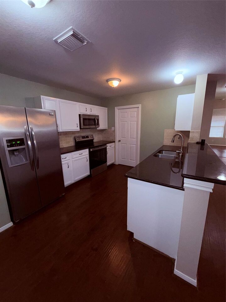 Property Photo: 1647 Prairie Shadows Way TX 77503