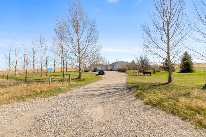 Property Photo:  242039 Range Road 261  AB T1P 0X1 