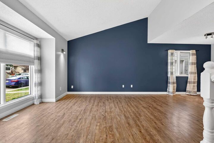 Property Photo:  32 Millrise Crescent SW  AB T2Y 2H6 