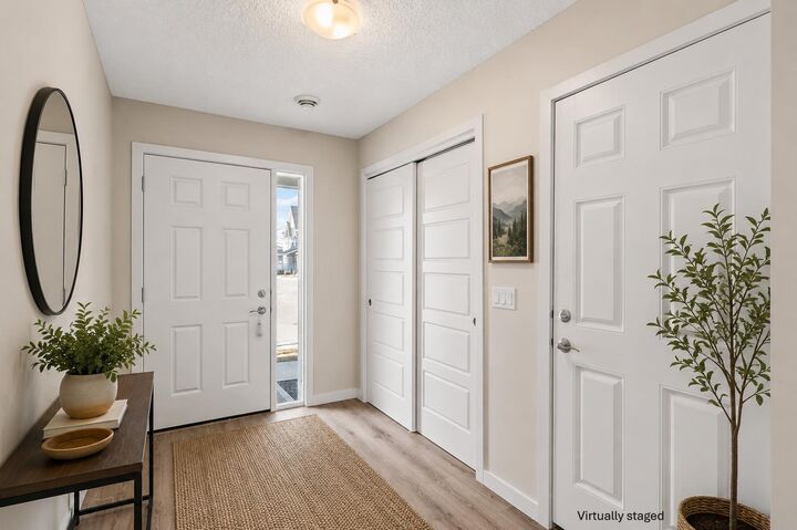 Property Photo: 32 Red Embers Parade NE 310 AB T3N 1P7