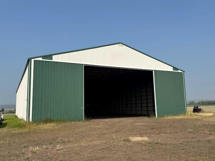 Property Photo: 742077 Range Road 64 AB T0H 3C0