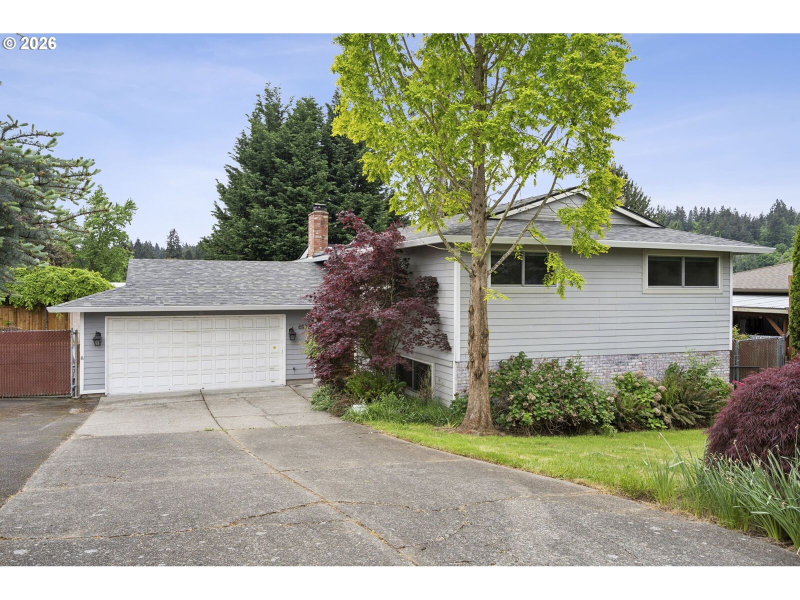 Property Photo:  6922 SE Renada St  OR 97267 