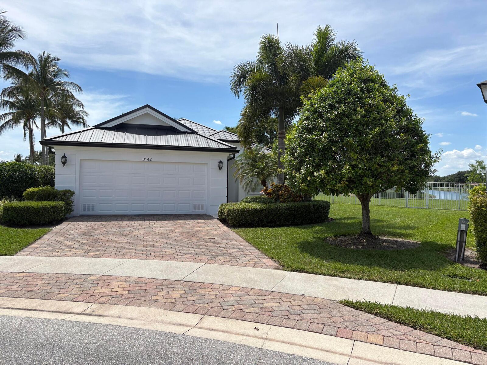 Property Photo:  8142 Jolly Harbour Court  FL 33414 