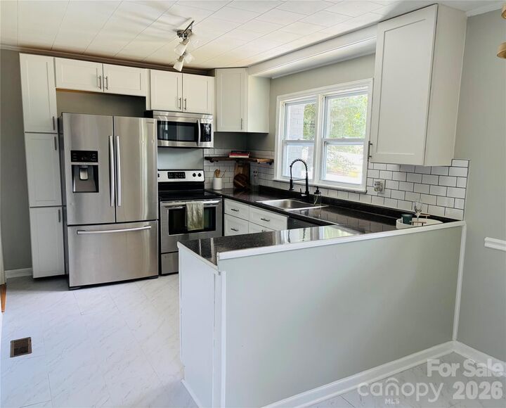 Property Photo:  305 Forestway Drive  NC 28120 