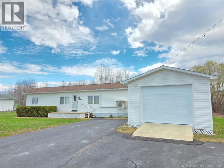 Property Photo:  225 Parc  NB E8K 1V9 