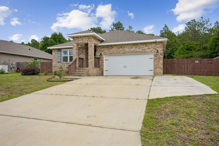 Property Photo:  4656 Red Oak Drive  FL 32583 