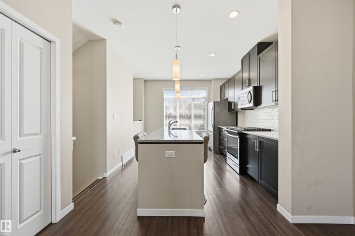 Property Photo:  320 Secord Boulevard NW 4  AB T5T 7E8 
