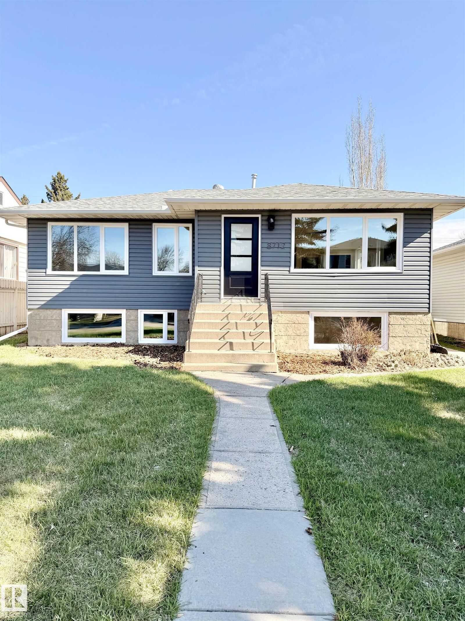 Property Photo:  8712 89 Avenue NW  AB T6C 1N7 