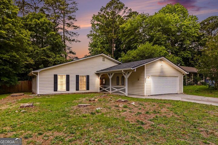 Property Photo:  8895 Wesley Place  GA 30238 