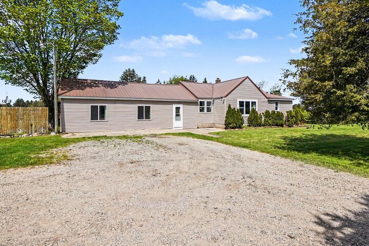 Property Photo:  8025 S Warner Avenue  MI 49412 