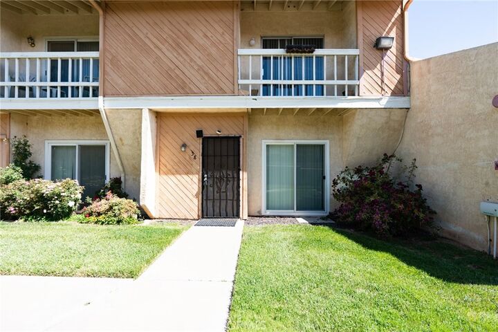 Property Photo:  16465 Green Tree Boulevard 58  CA 92395 