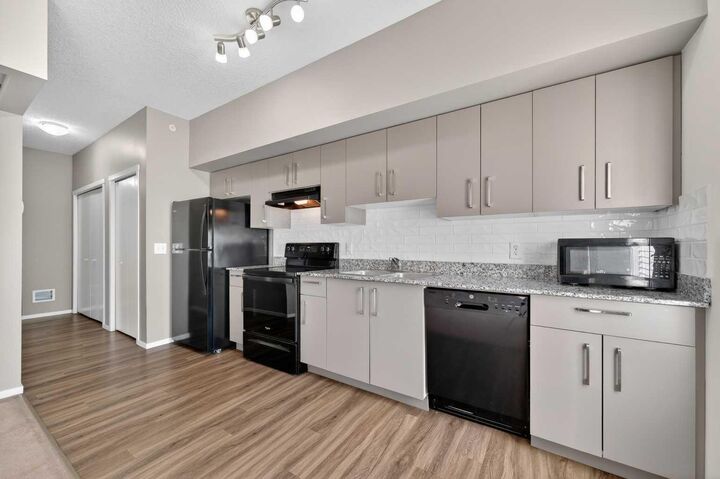 Property Photo:  4641 128 Avenue NE 1611  AB T3N 1T4 