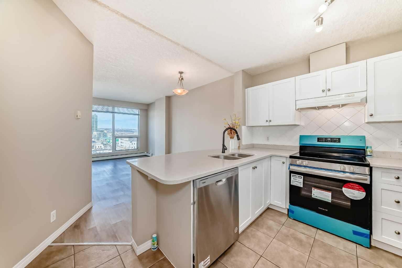 Property Photo:  1053 10 Street SW 707  AB T2R 1S6 