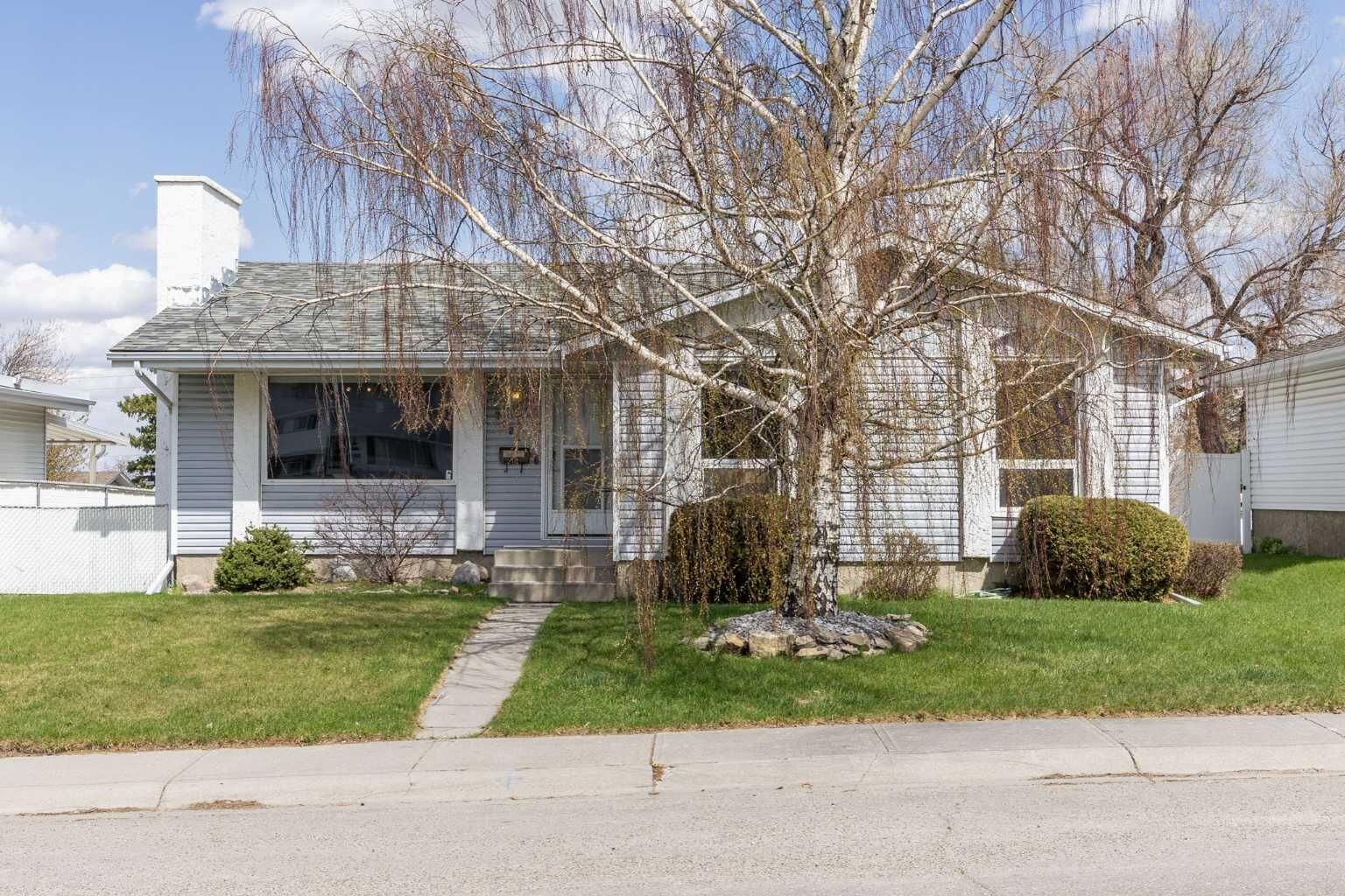 Property Photo:  7720 Hunterquay Road NW  AB T2K 4T8 