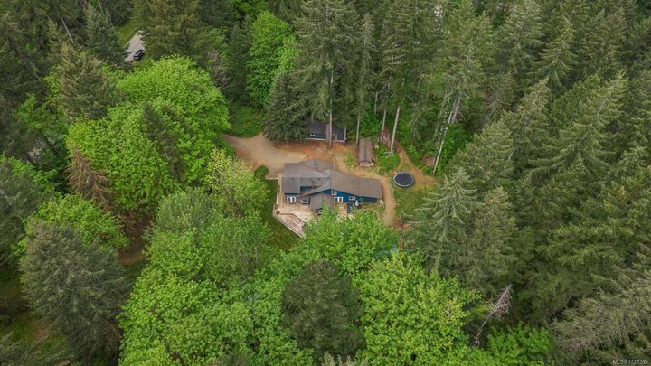 Property Photo:  9525 Doyle Rd  BC V9J 1E7 