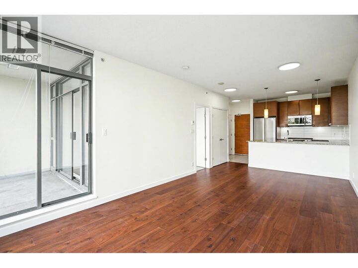 Property Photo:  6888 Alderbridge Way 702  BC V8B 0L8 
