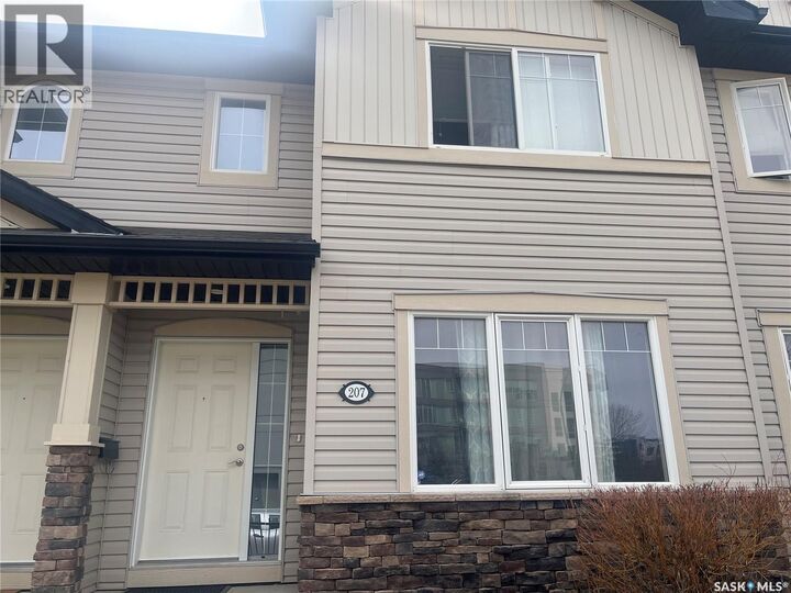 Property Photo:  207 303 Slimmon Place  SK S7V 0A8 
