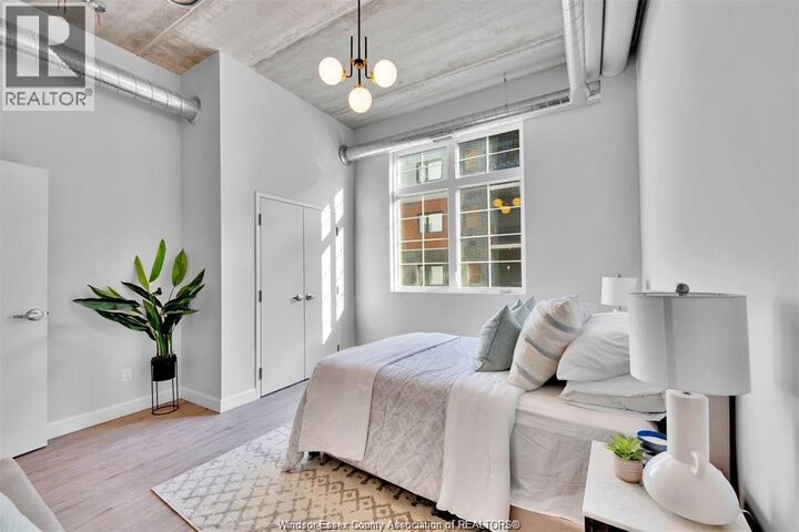 Property Photo:  11941 Tecumseh Road East 306  ON N8N 1L8 