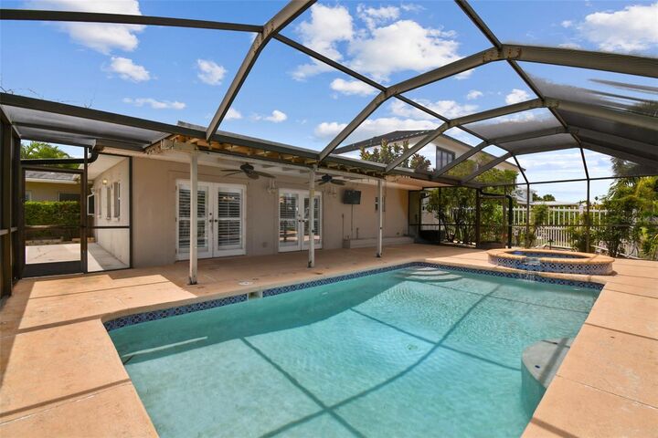 Property Photo: 3921 E Eden Roc Circle FL 33634