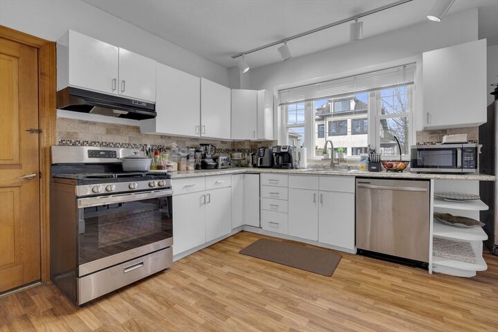 Property Photo:  64 Commonwealth Rd  MA 02472 