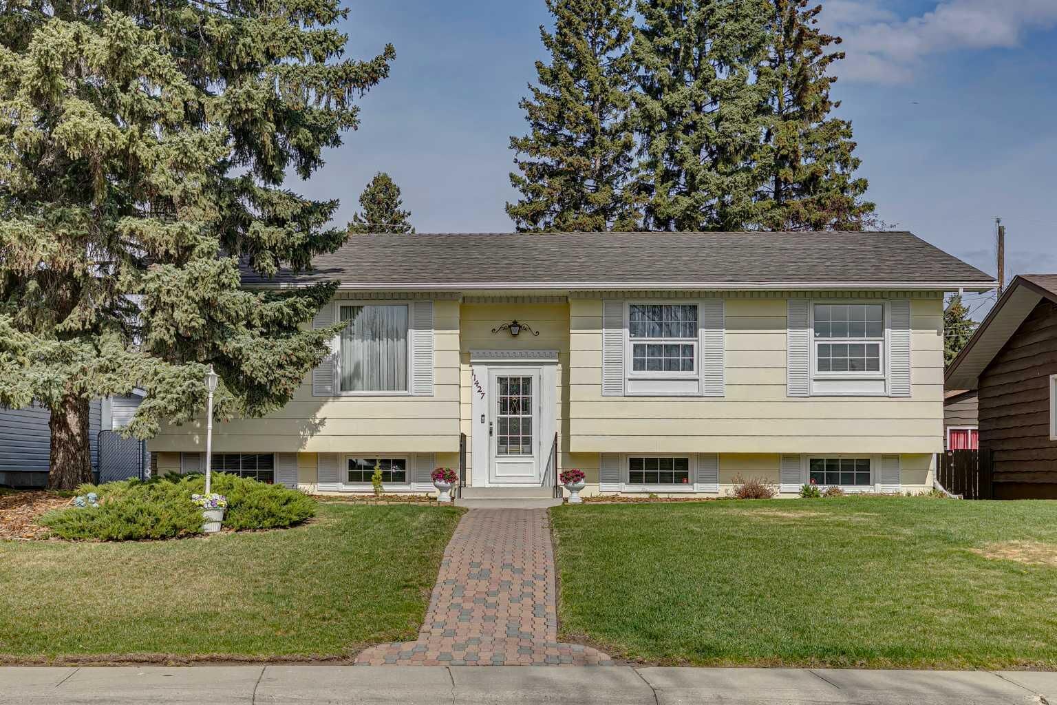 Property Photo:  11427 Wilkes Road SE  AB T2J 2E5 