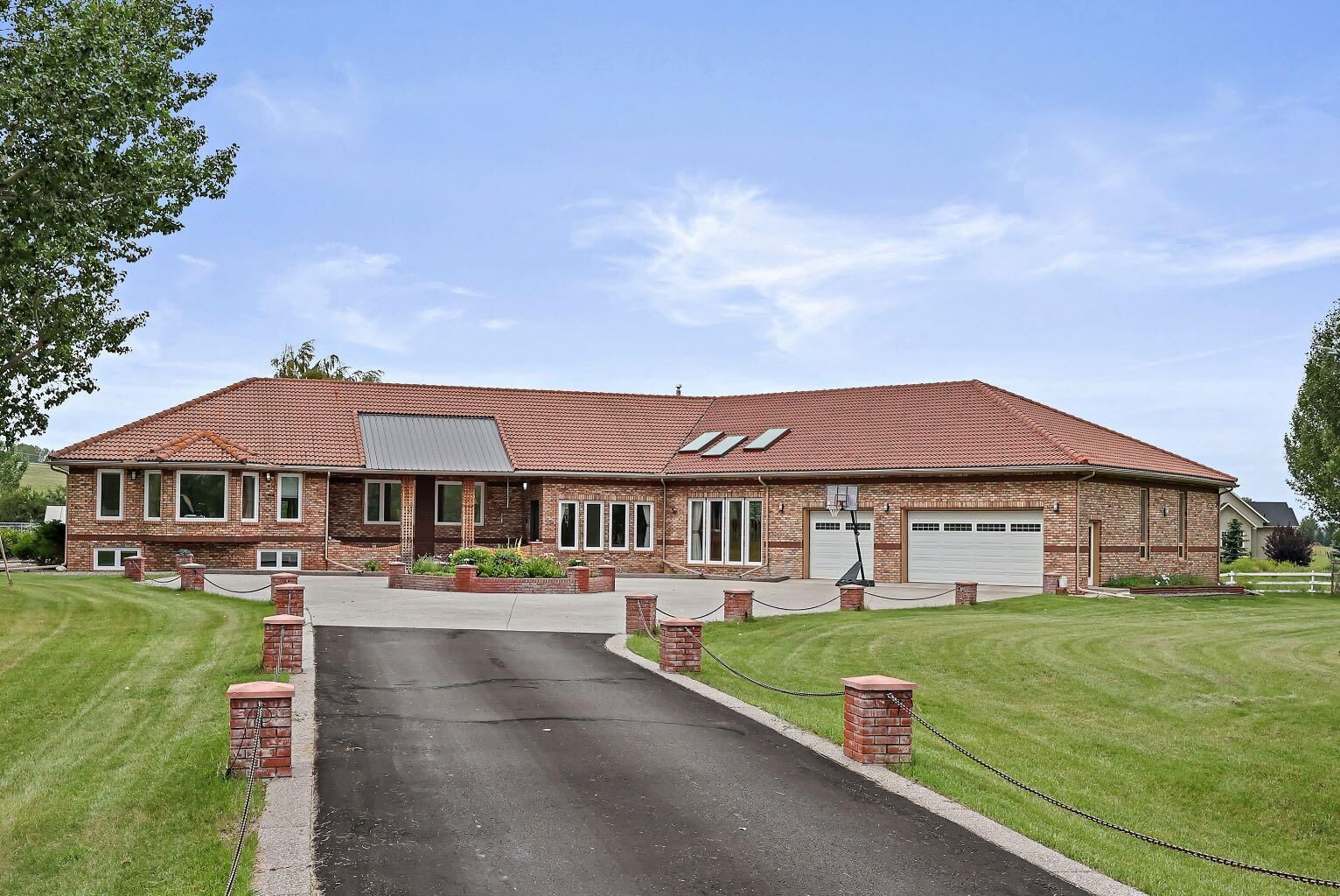 Property Photo:  242125 8 Street E  AB T1S 3L2 