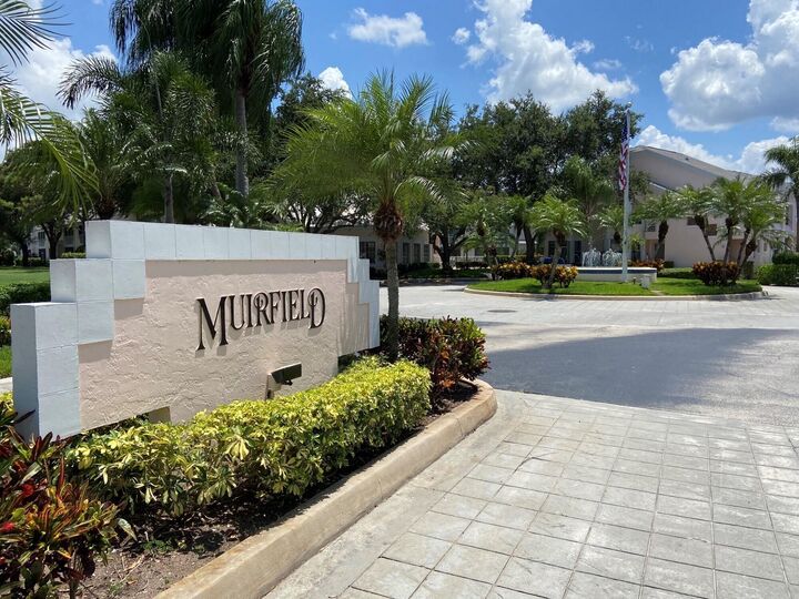 Property Photo:  101 Muirfield Court 101-F  FL 33458 