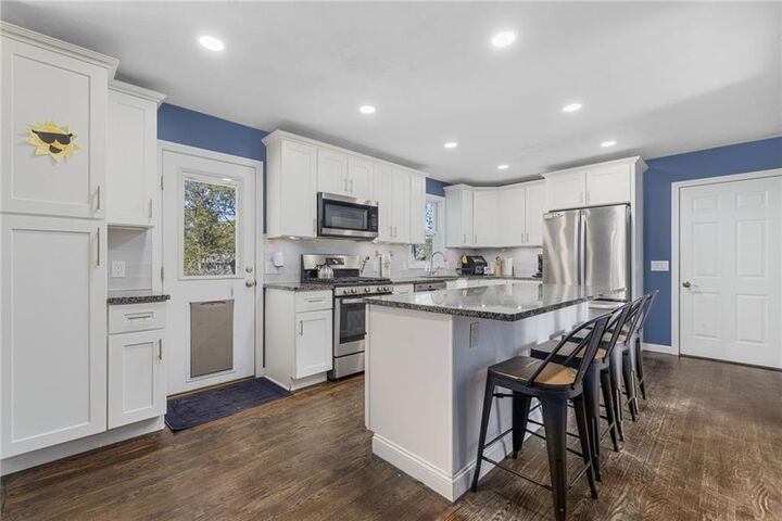 Property Photo:  64 Long Court  RI 02920 