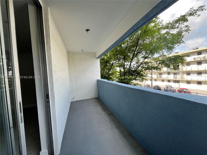 Property Photo:  5050 NW 7th St 220  FL 33126 