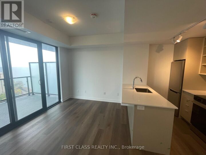 Property Photo: 2075 Lakeshore Road 2003 ON L7R 0H3