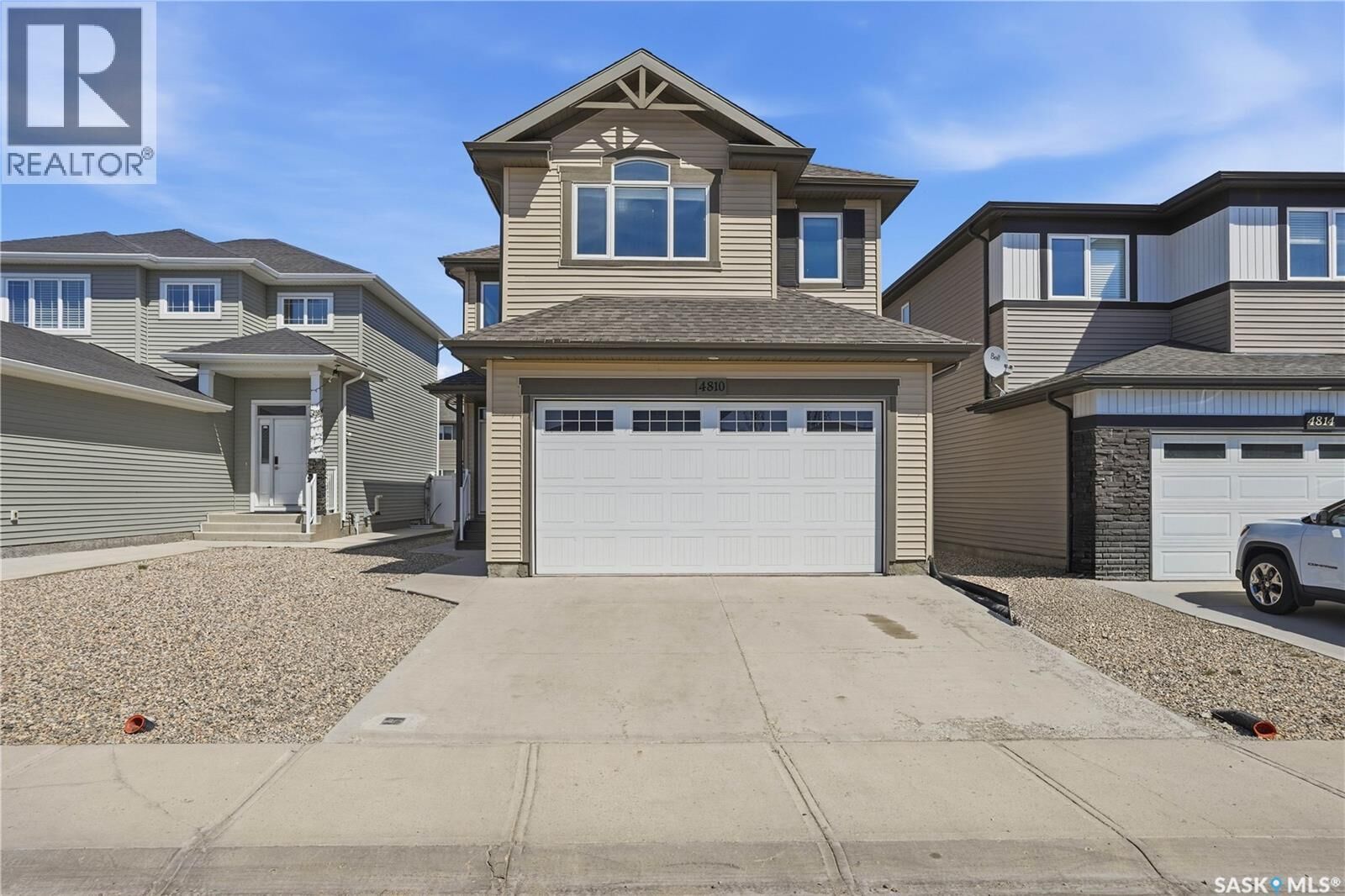Property Photo:  4810 Green Brooks Way E  SK S4V 3K6 