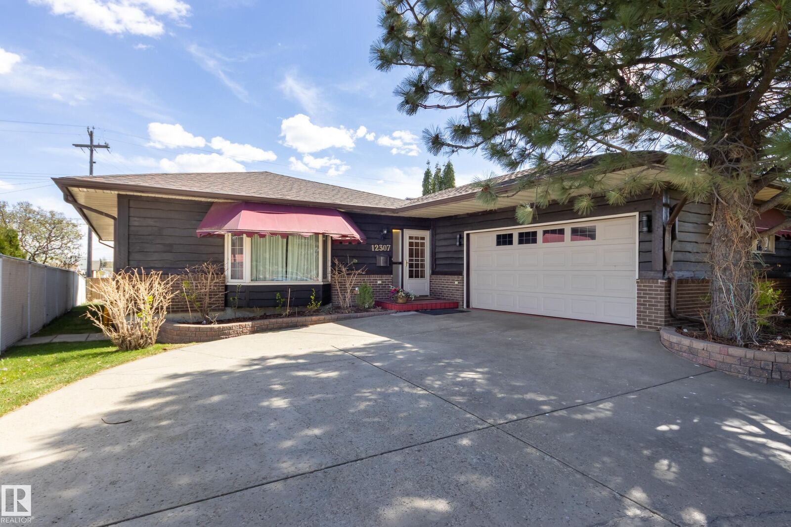 Property Photo:  12307 54 Street NW  AB T5W 3N7 