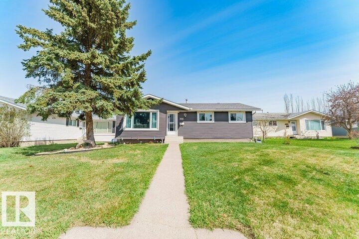 Property Photo:  7012 44 Avenue NW  AB T6K 0V2 