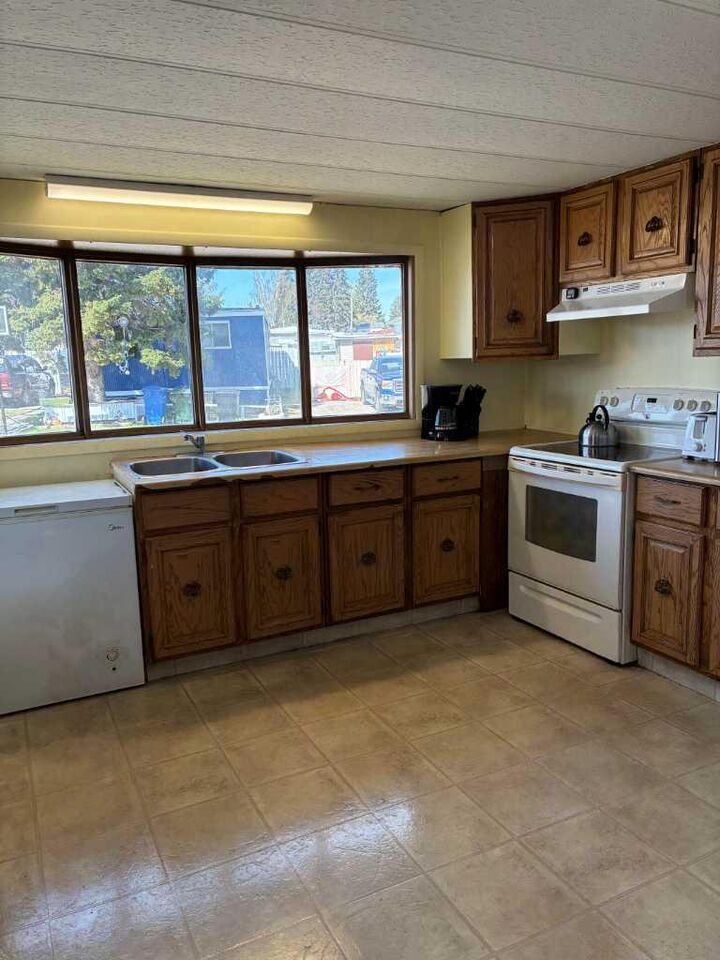 Photo de la propriété:  1190 15 Avenue 21  AB T0M 0W0 