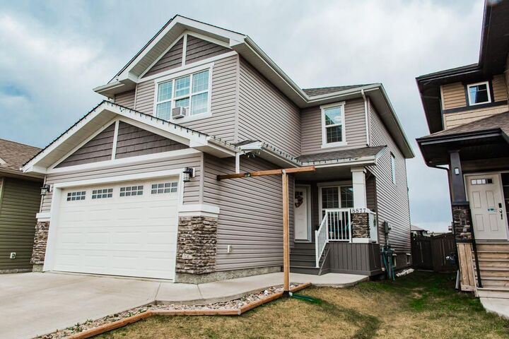Property Photo:  8877 85A Avenue  AB T8X 0R5 