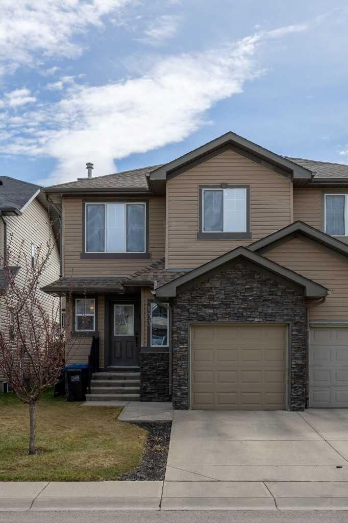 Property Photo:  133 Luxstone Way SW  AB T4B 3C2 