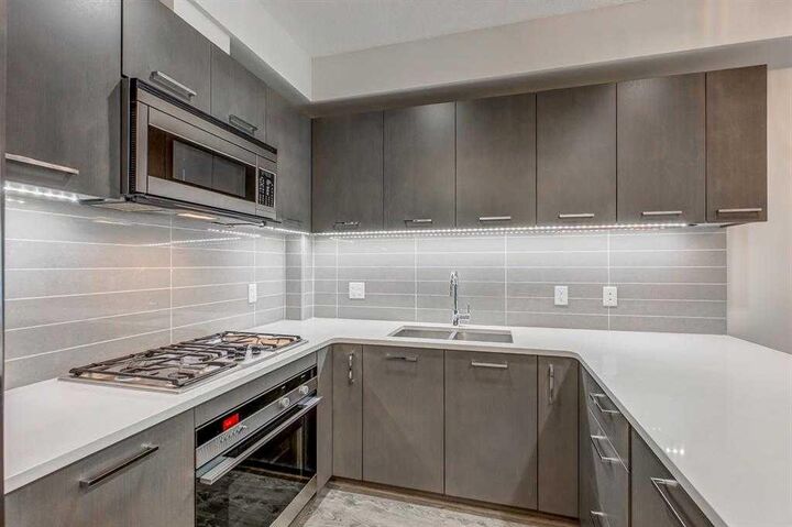 Property Photo:  323 20 Avenue SW 102  AB T2S 2G5 