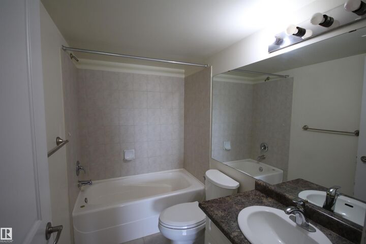 Property Photo:  17404 64 Avenue NW 422  AB T5T 6X4 