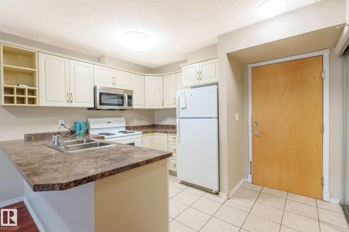Property Photo: 17404 64 Avenue NW 422 AB T5T 6X4