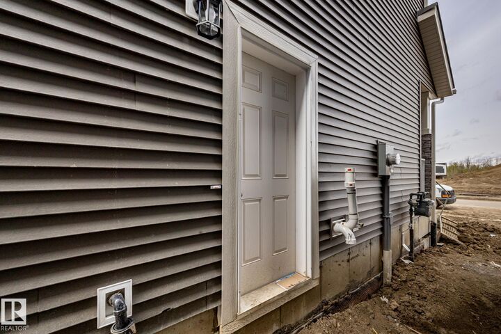 Property Photo:  211 157 Avenue NE  AB T5Y 6K8 