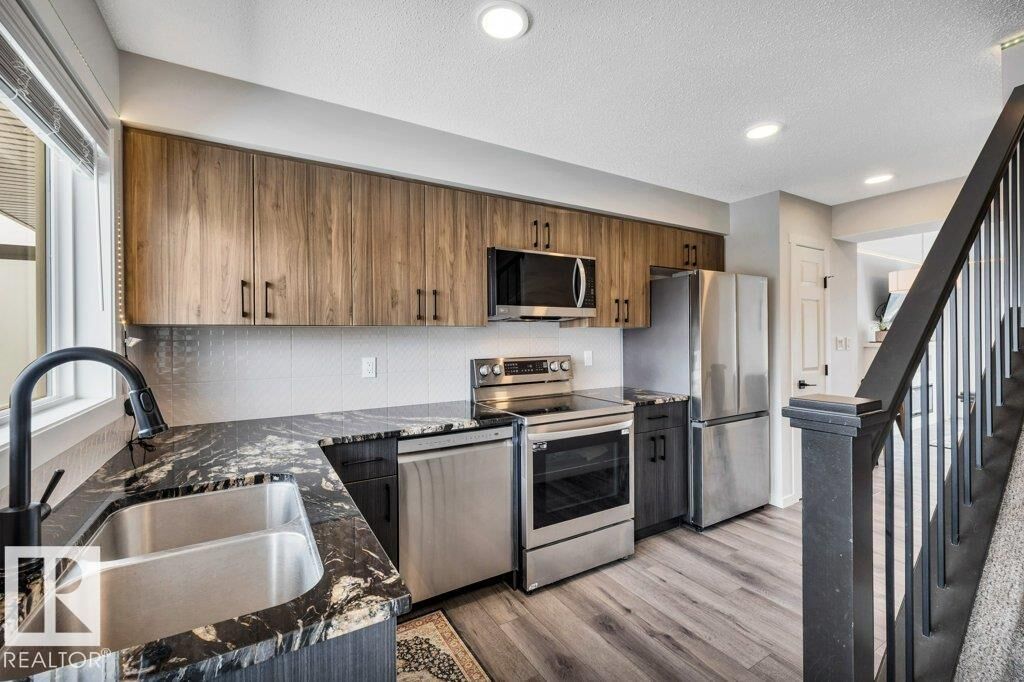 Property Photo:  1530 Tamarack Boulevard NW 28  AB T6T 2E6 