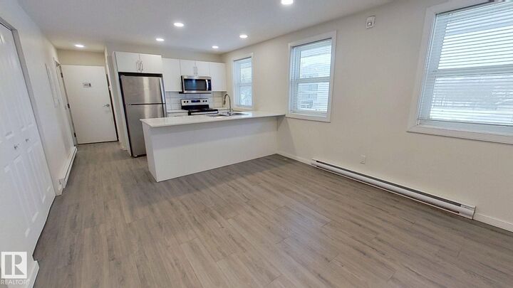 Property Photo:  4816 52 Street 4  AB T9A 3N2 