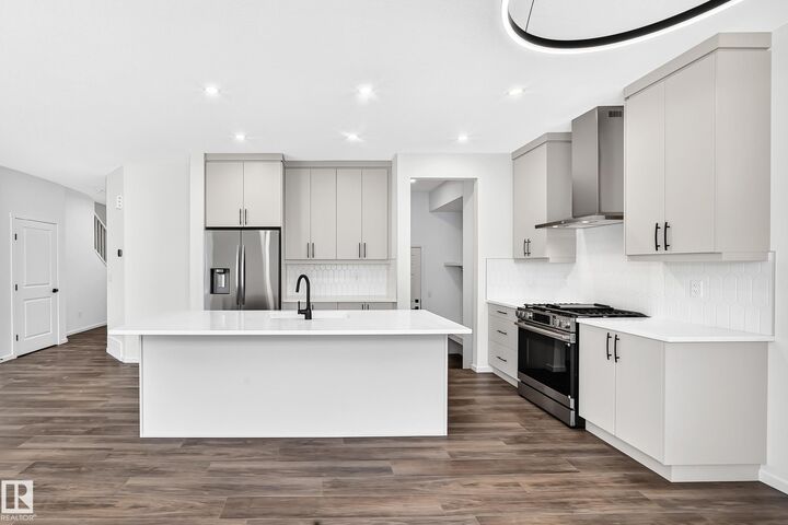 Property Photo: 1508 205 Street NW AB T6M 3E7